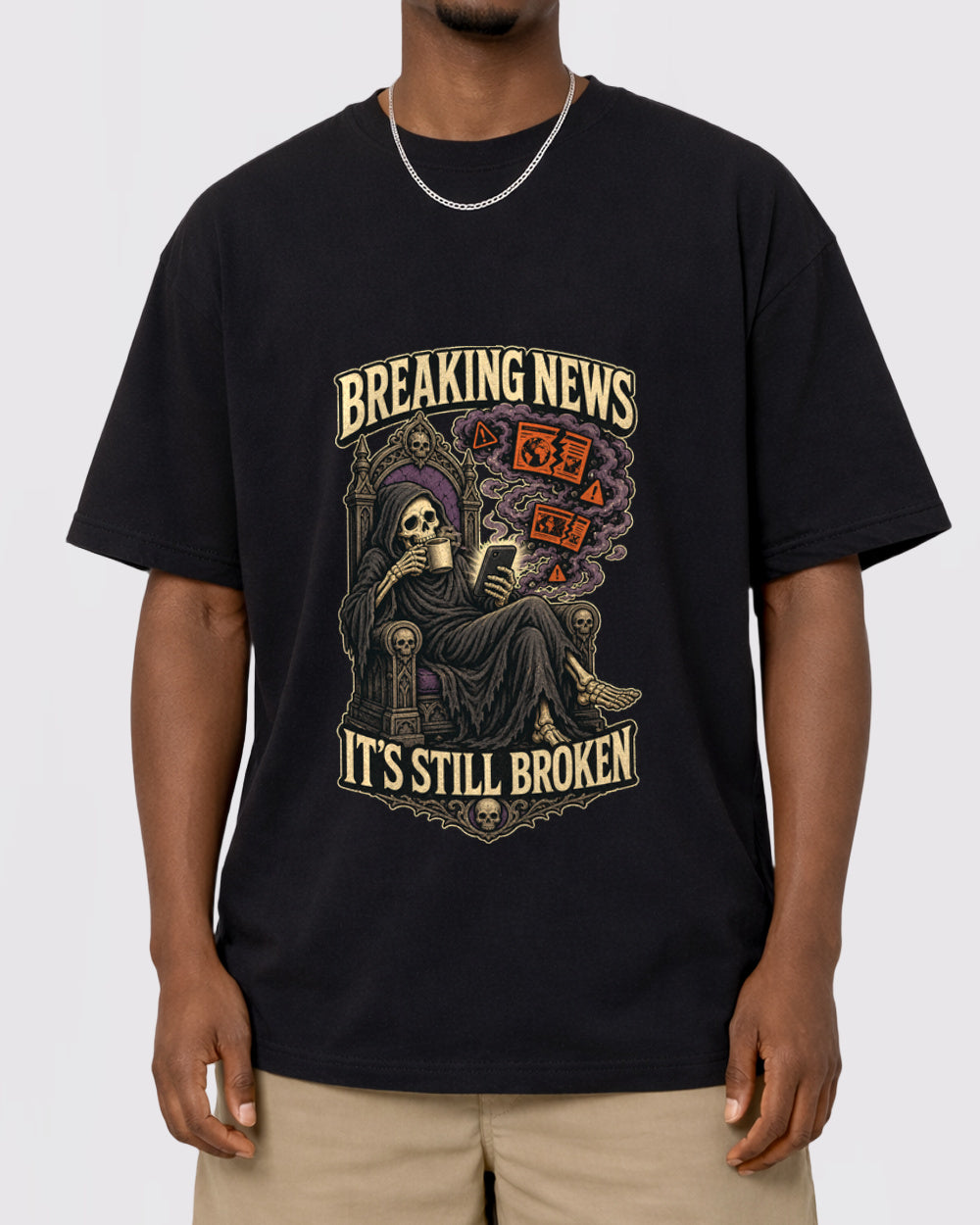 Breaking News It's Still Broken Dark Graphic T-Shirt, primary front view, image 1