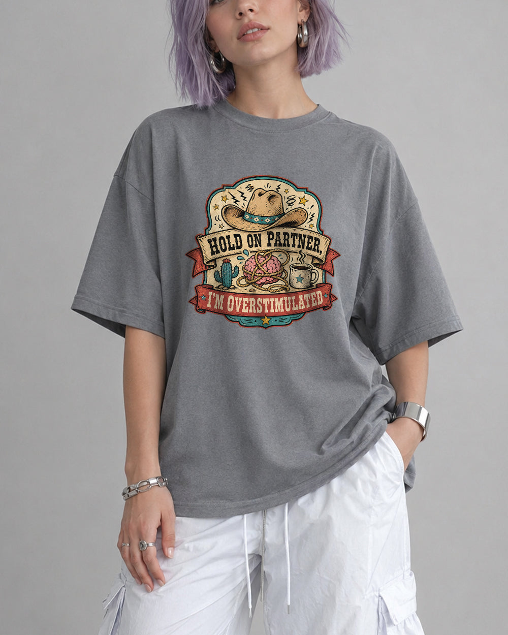 Hold On Partner, I'm Overstimulated Funny Graphic T-Shirt in Gray, front model view 4
