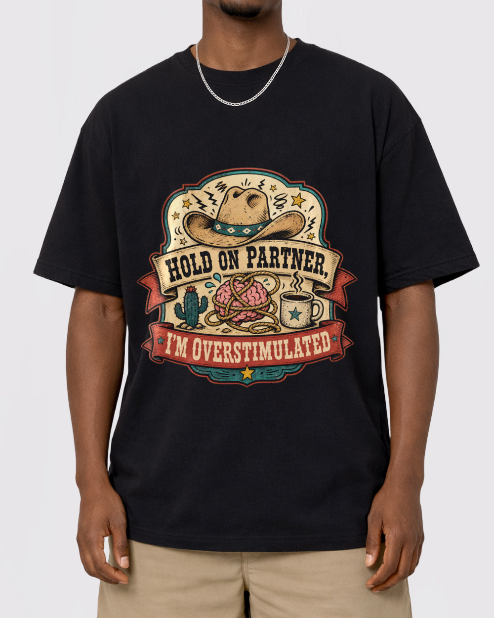 Hold On Partner, I'm Overstimulated Funny Graphic T-Shirt, primary front view, image 1