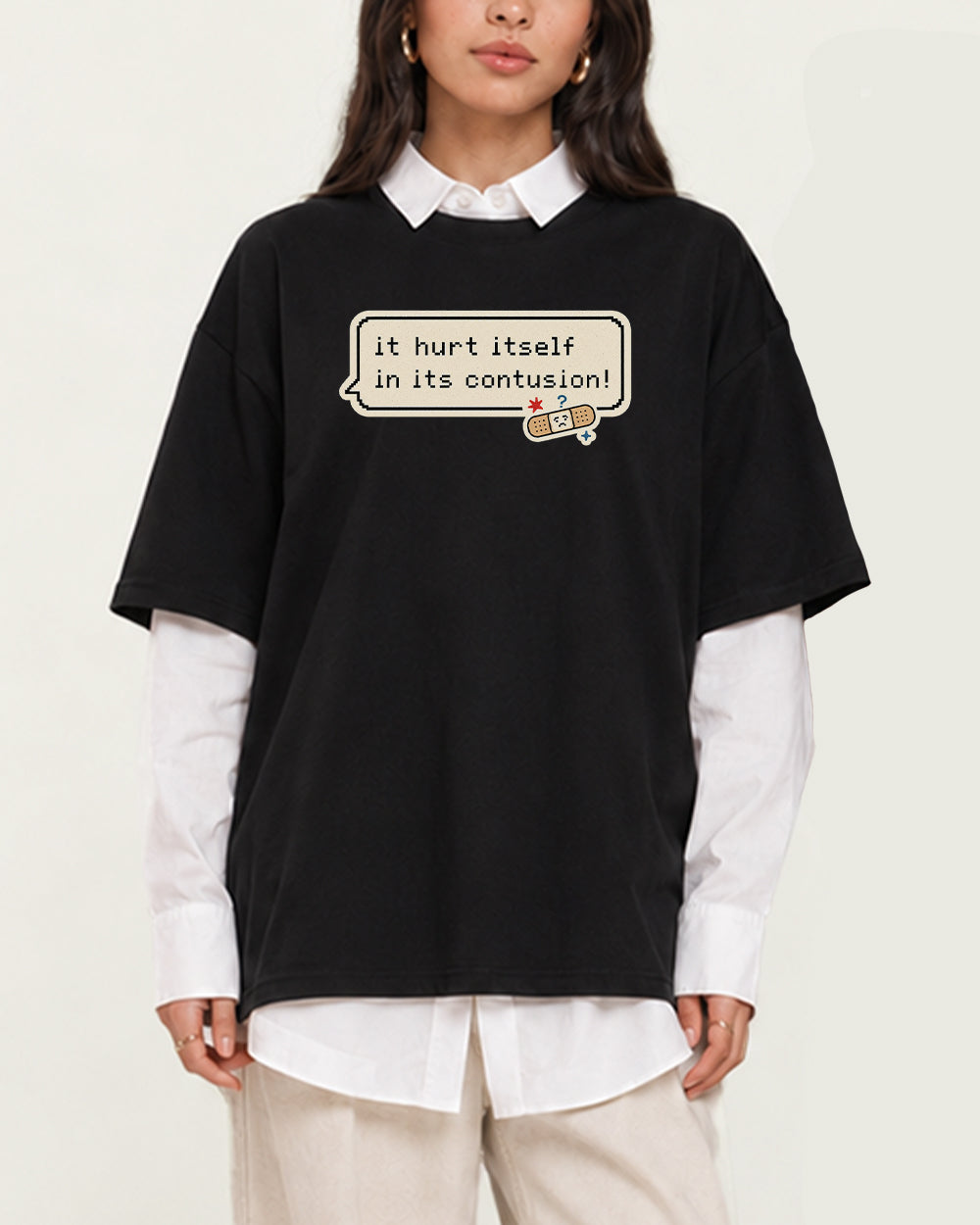 It Hurt Itself In Its Contusion Pop Culture Graphic T-Shirt in Black, front model view 1