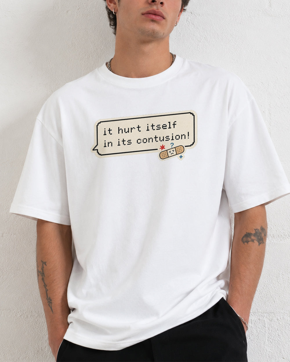 It Hurt Itself In Its Contusion Pop Culture Graphic T-Shirt in White, front model view 7