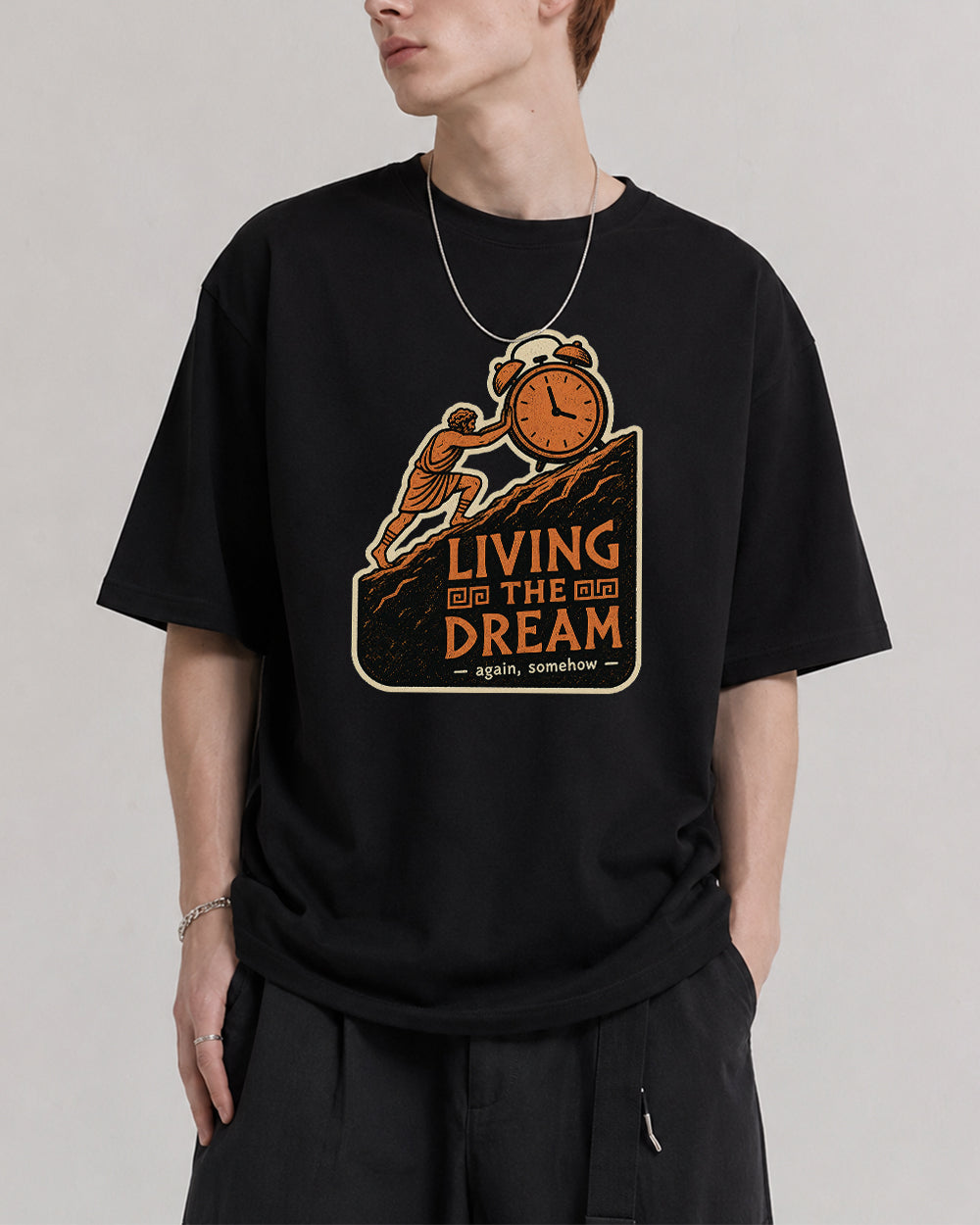 Living the Dream Pop Culture Graphic T-Shirt in Black, front model view 1
