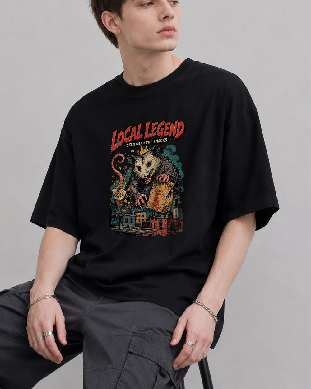 Local Legend Seen Near the Snacks Retro Graphic T-Shirt in Black, front model view 1