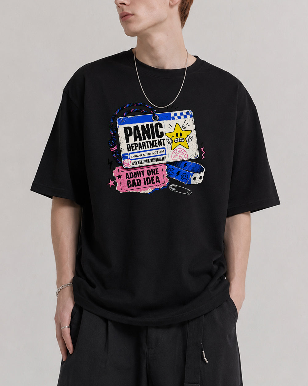 Panic Department, Admit One Bad Idea Funny Graphic T-Shirt in Black, front model view 1