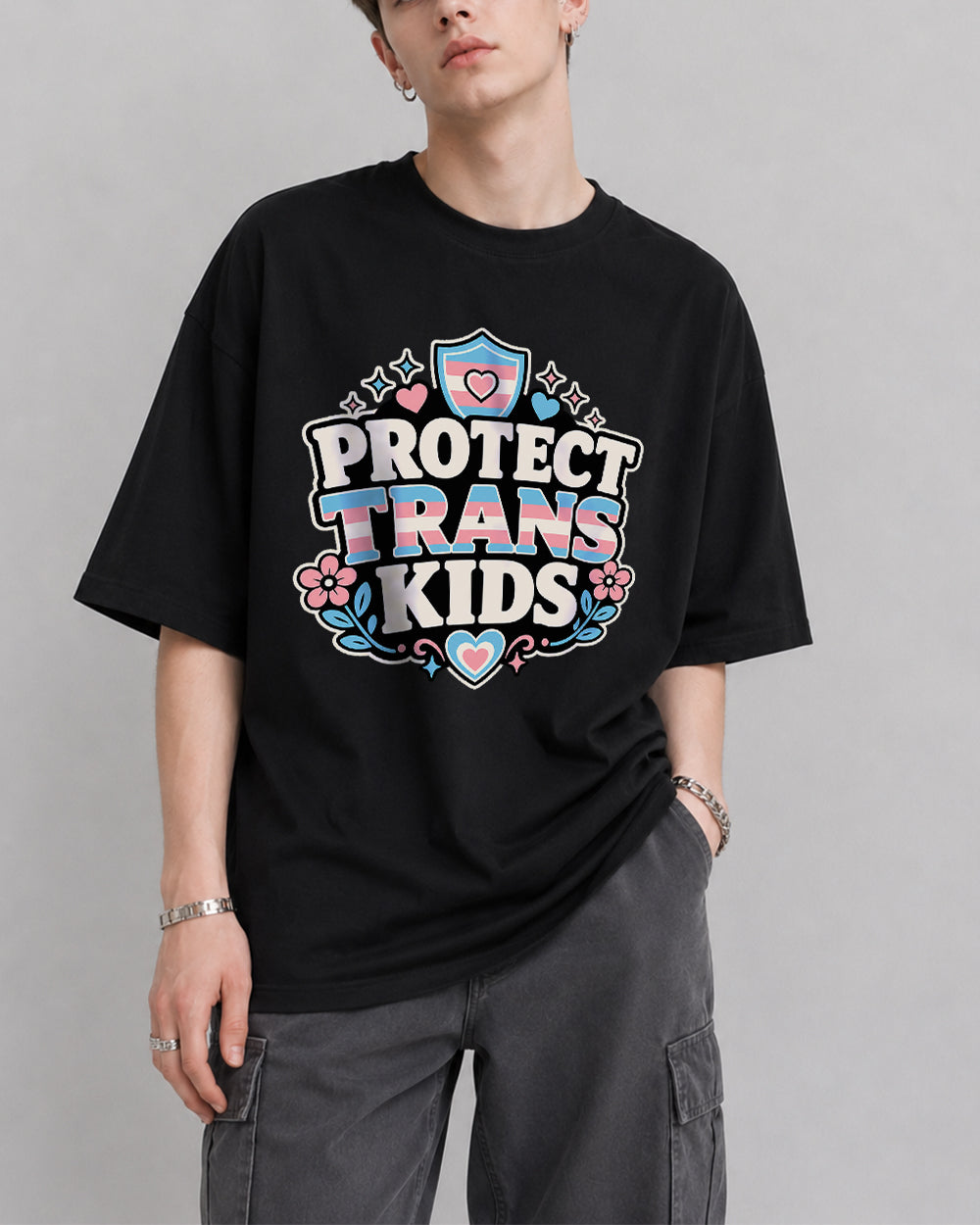 Protect Trans Kids Pop Culture Graphic T-Shirt in Black, front model view 1