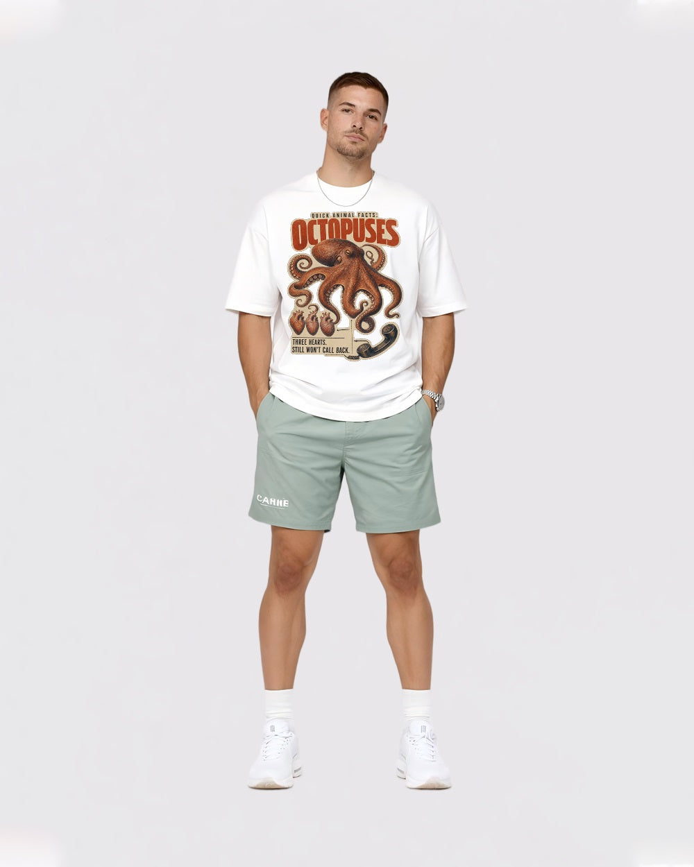 White T-shirt with lively rooster graphic and confident pose