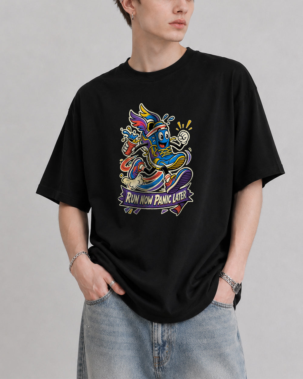 Run Now, Panic Later Sports Graphic T-Shirt in Black, front model view 1