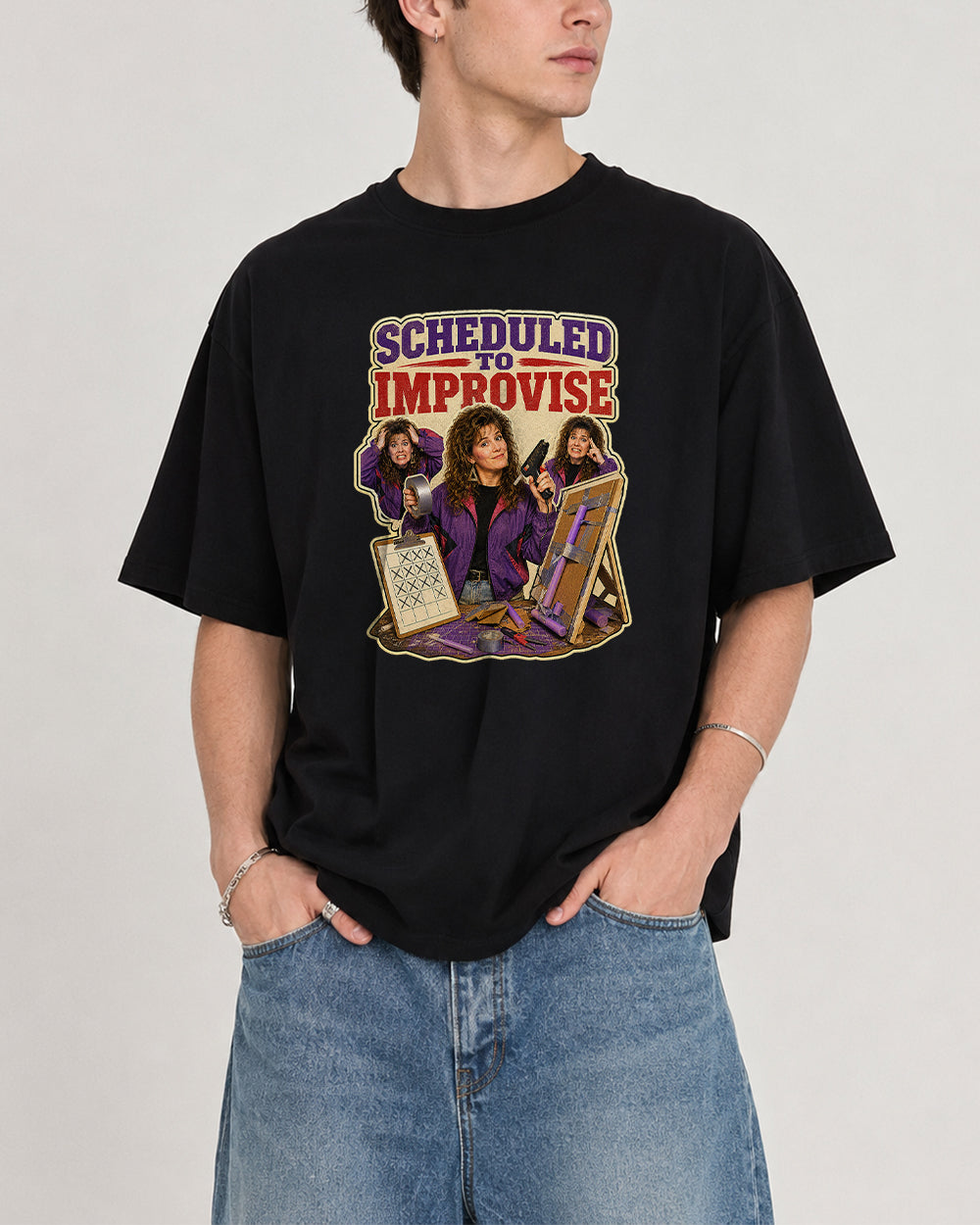 Scheduled to Improvise Pop Culture Graphic T-Shirt in Black, front model view 2