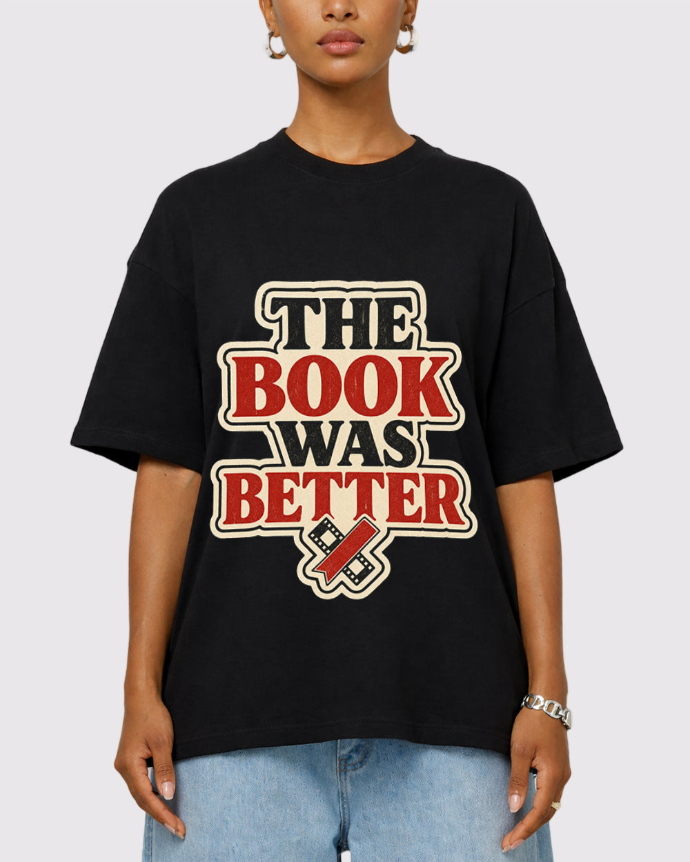 The Book Was Better Pop Culture Graphic T-Shirt, primary front view, image 1