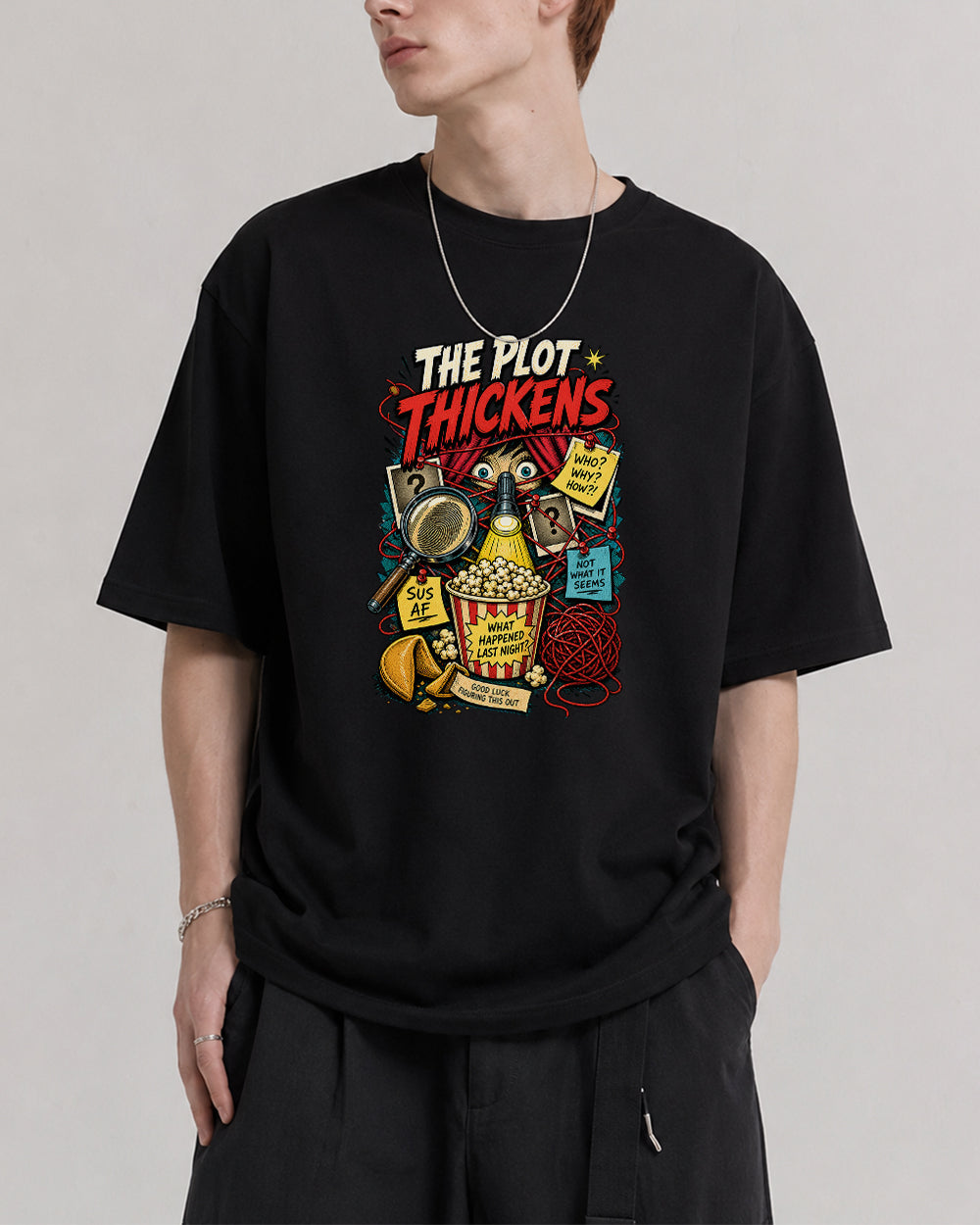 The Plot Thickens Retro Graphic T-Shirt in Black, front model view 1