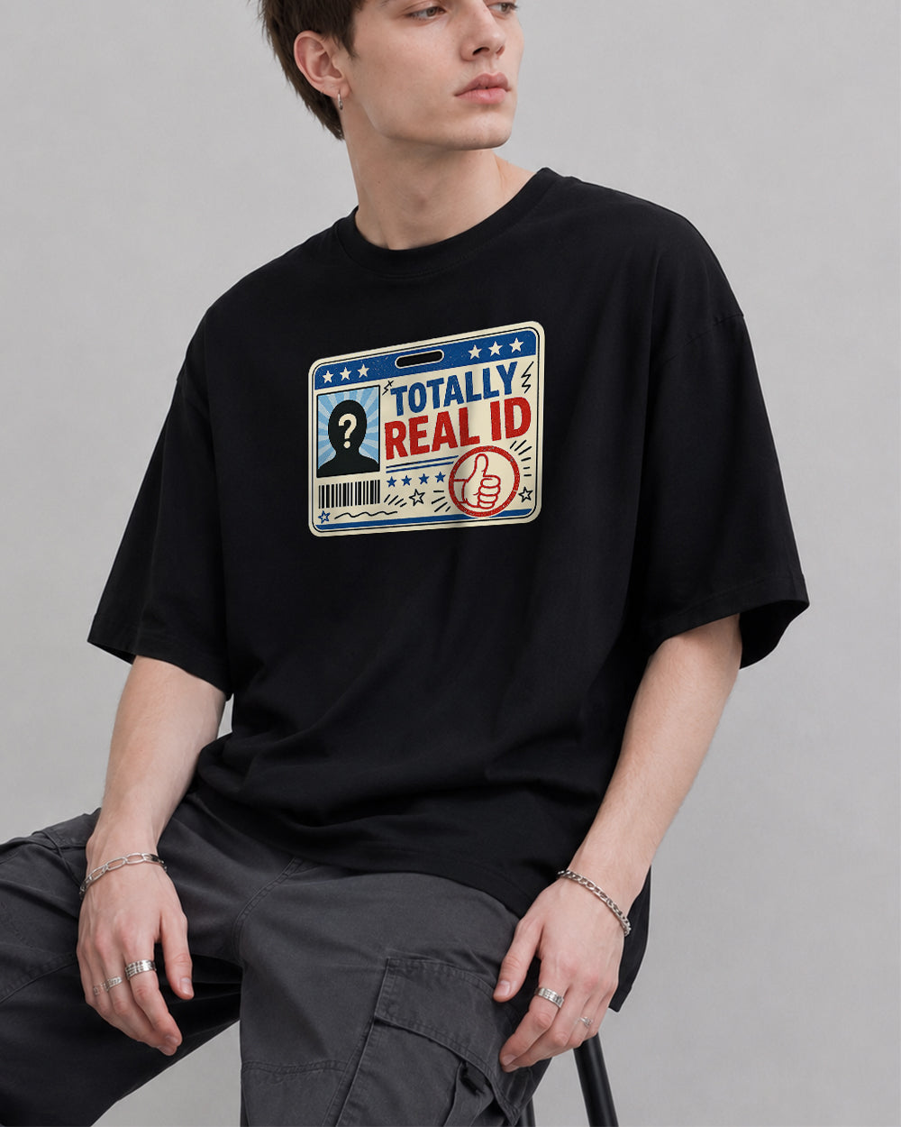 Totally Real ID Pop Culture Graphic T-Shirt in Black, front model view 1